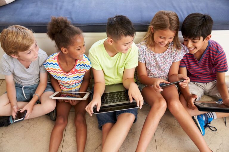 tech savvy kids with friends