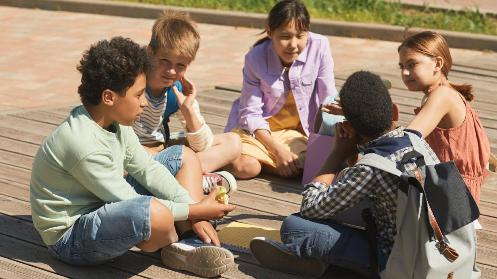 a group of 6 - 8 year old kids doing discussion